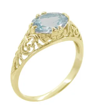 Edwardian Oval Aquamarine Filigree Ring in 14 Karat Yellow Gold