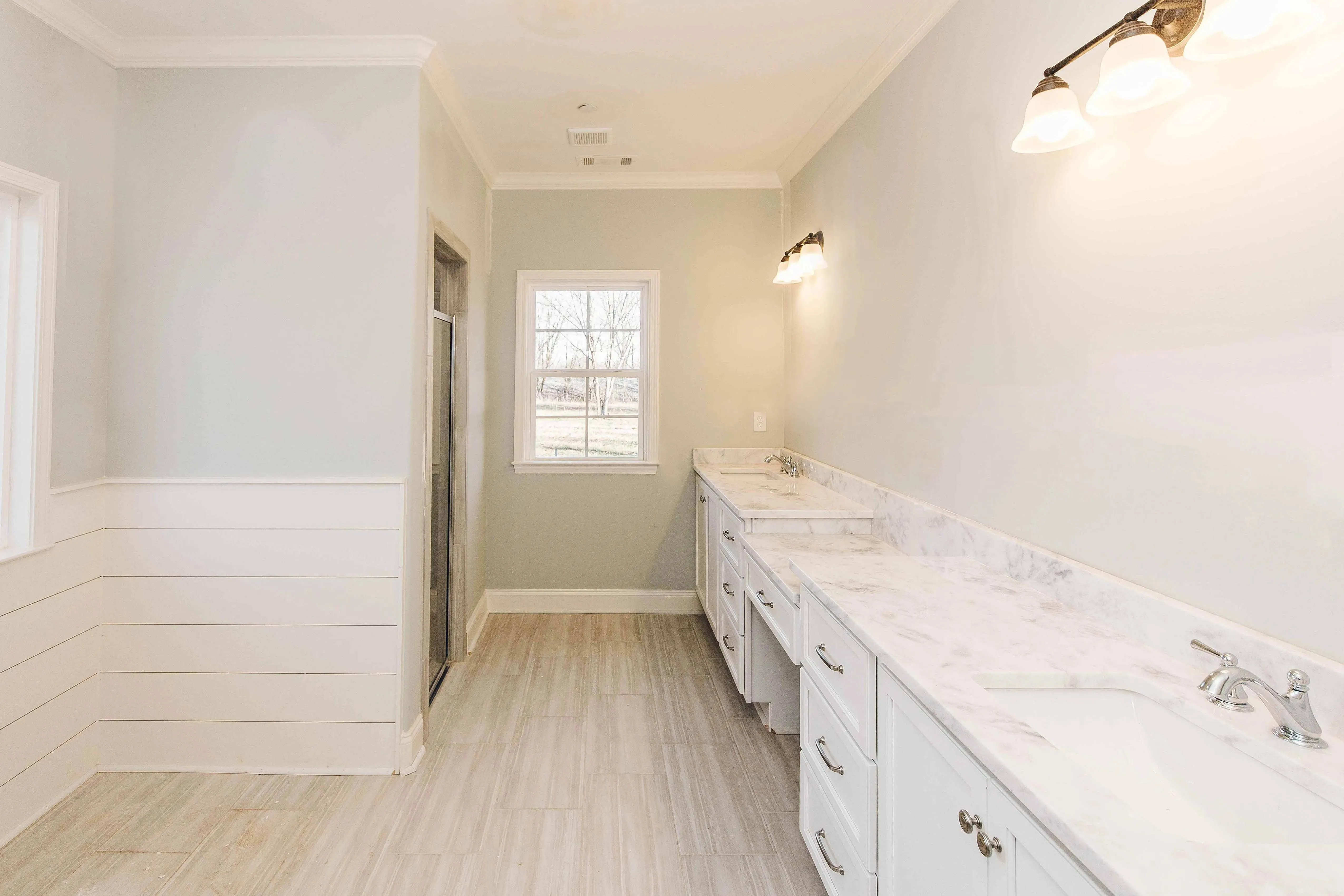 Elegant family home with spacious living, bonus room, and outdoor kitchen.