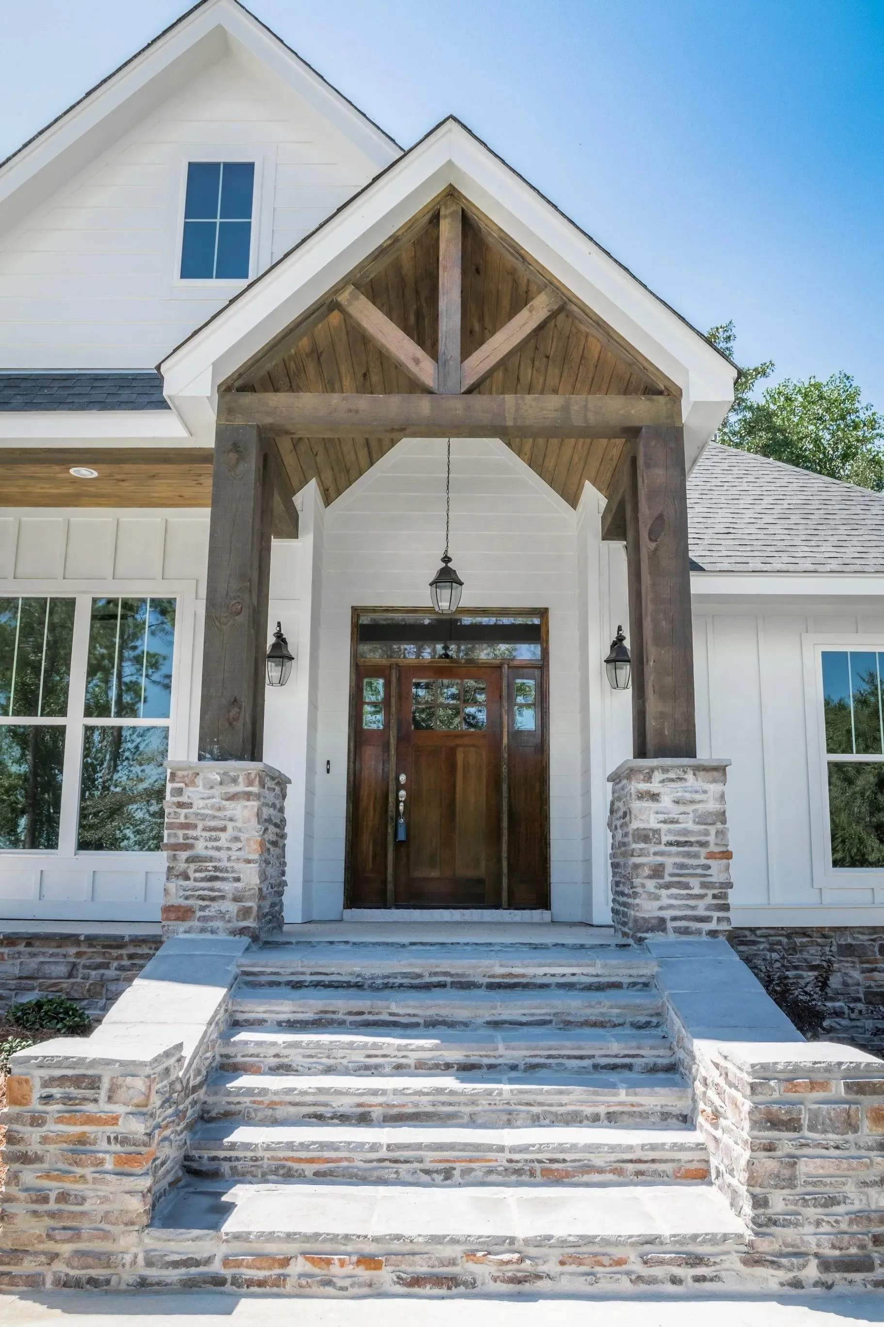 Elegant family home with spacious living, bonus room, and outdoor kitchen.
