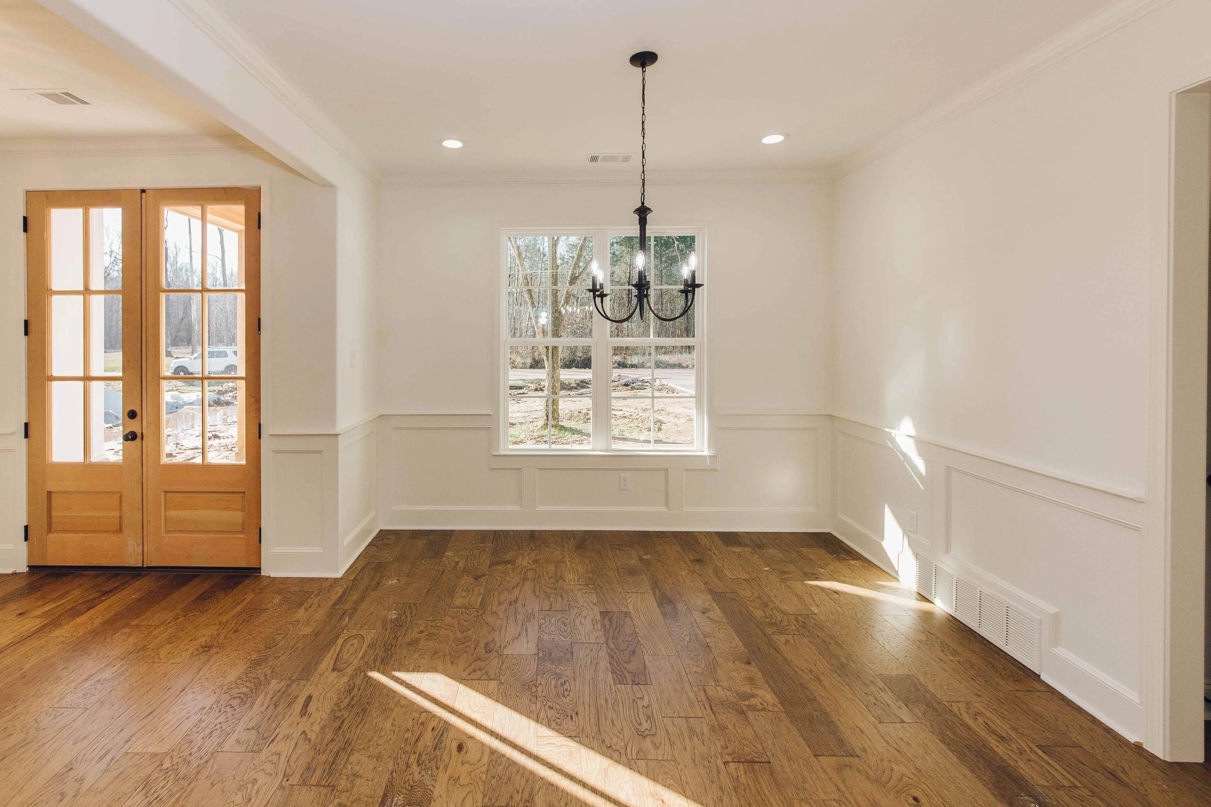Elegant family home with spacious living, bonus room, and outdoor kitchen.