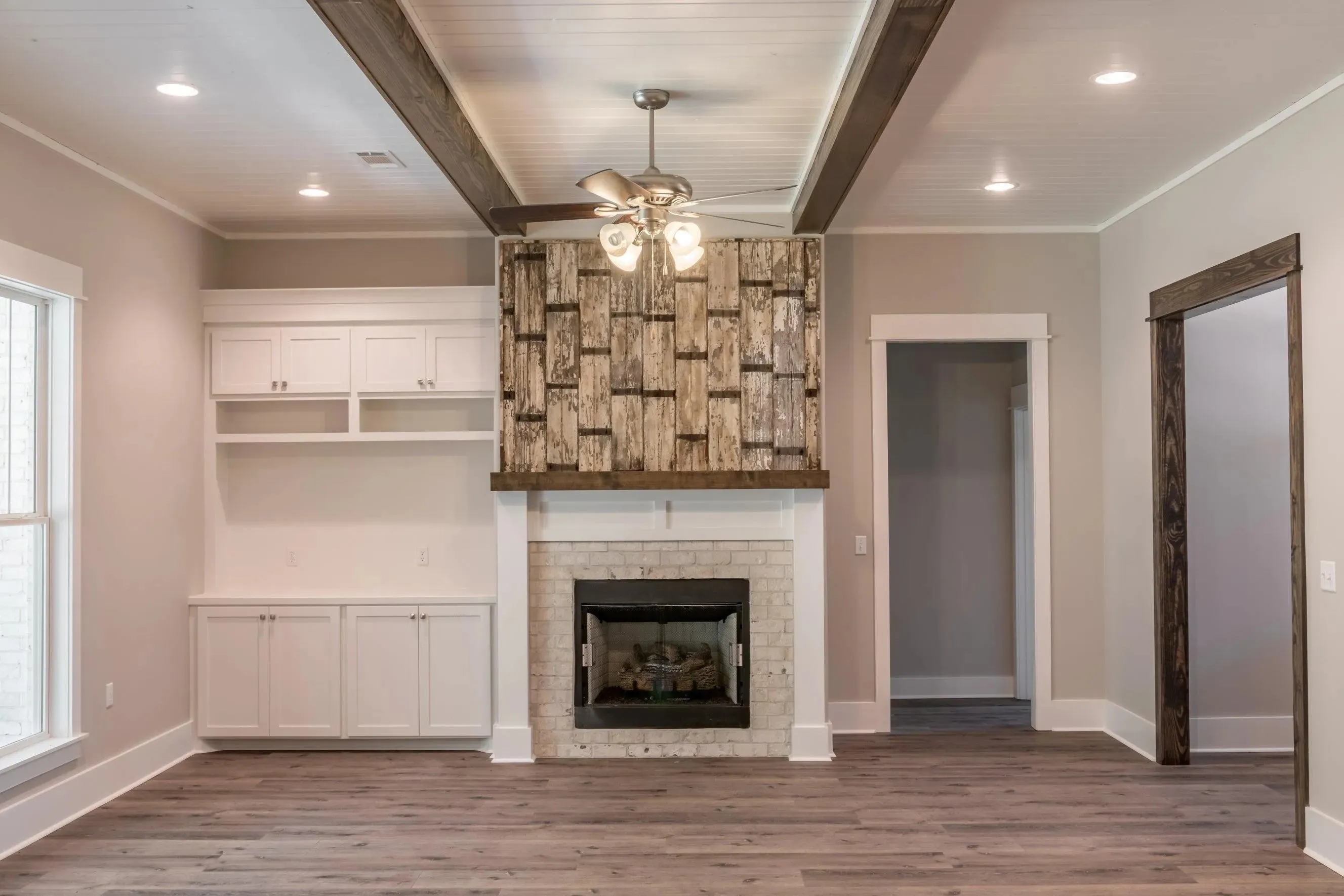 Elegant family home with spacious living, bonus room, and outdoor kitchen.