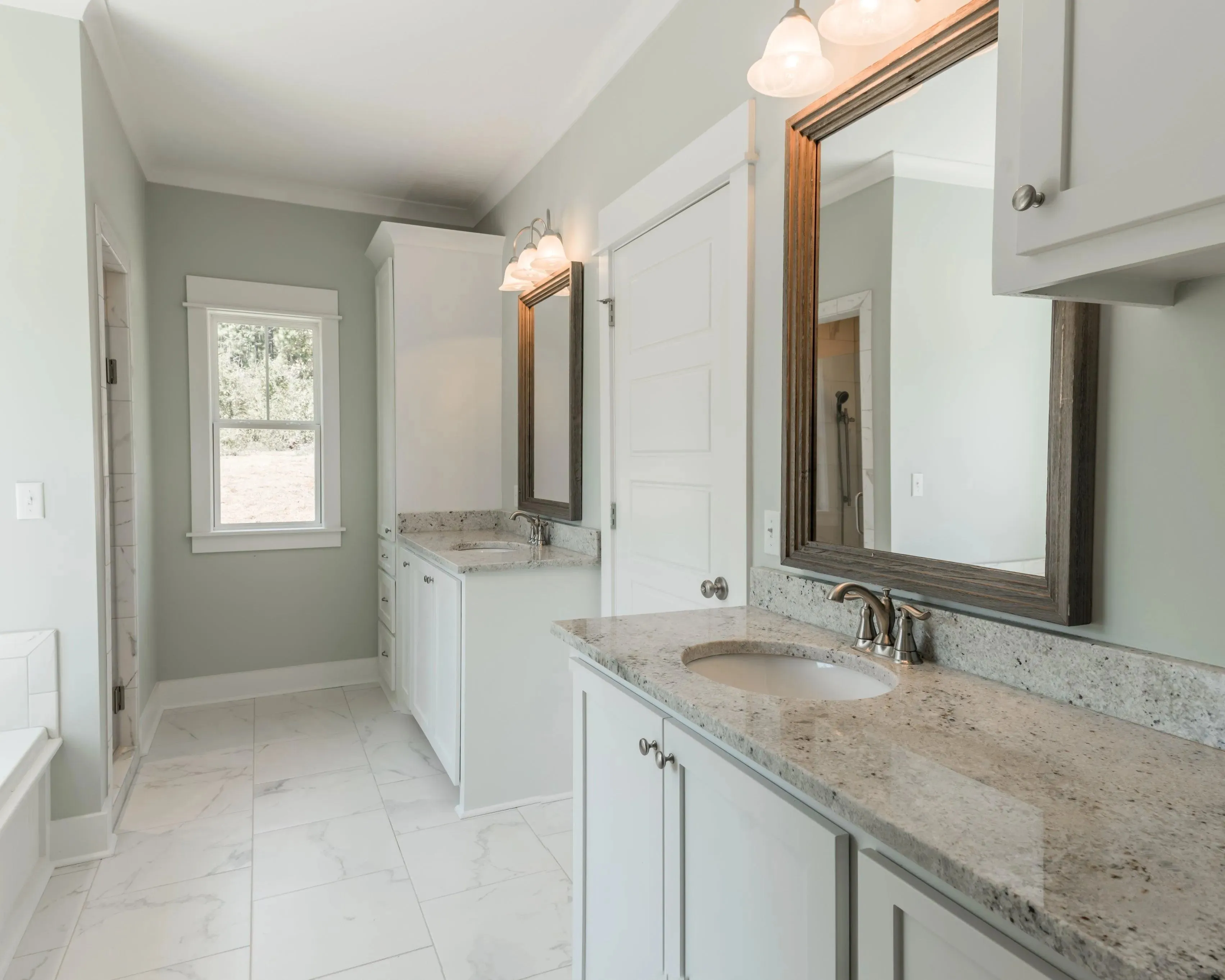 Elegant family home with spacious living, bonus room, and outdoor kitchen.