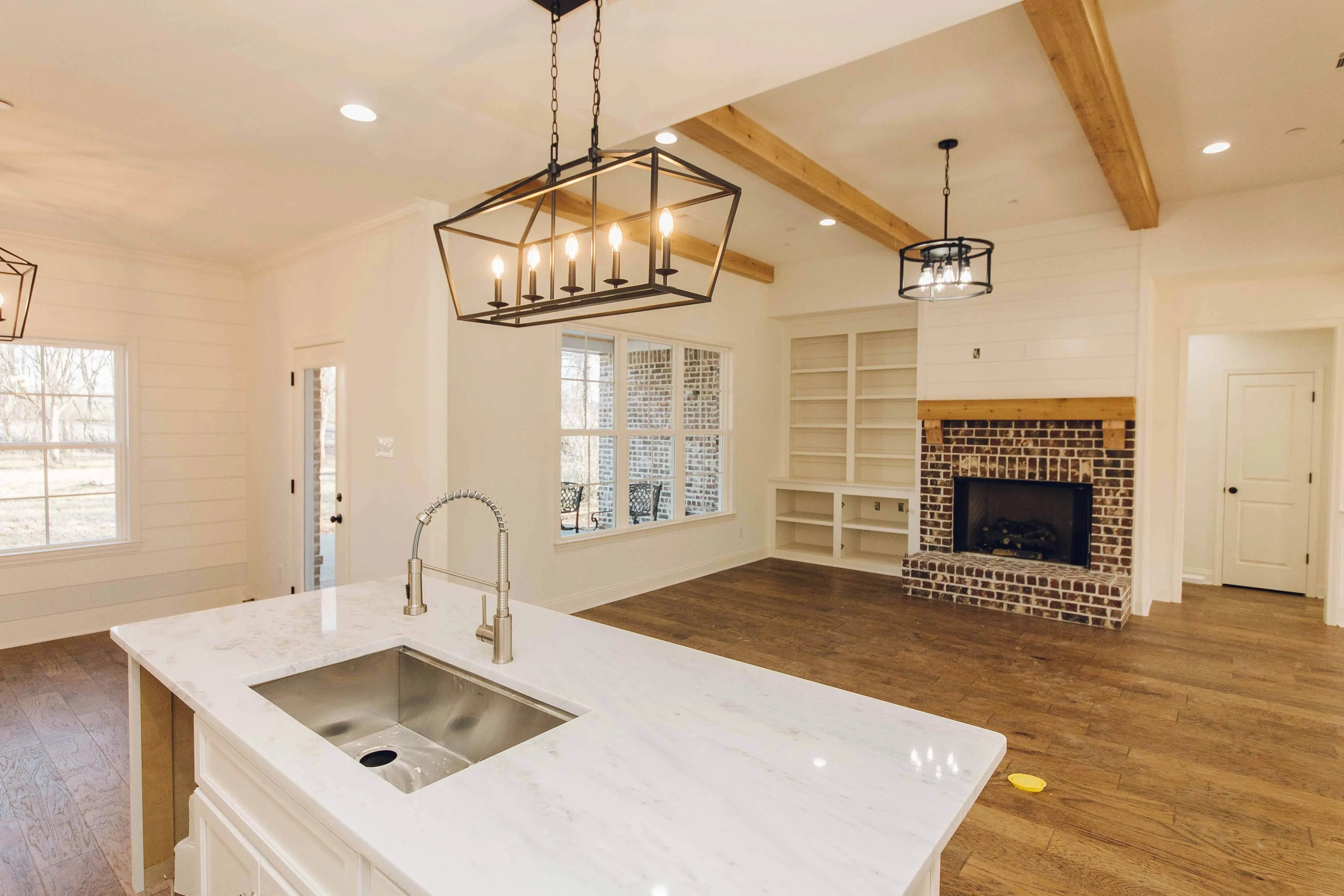 Elegant family home with spacious living, bonus room, and outdoor kitchen.