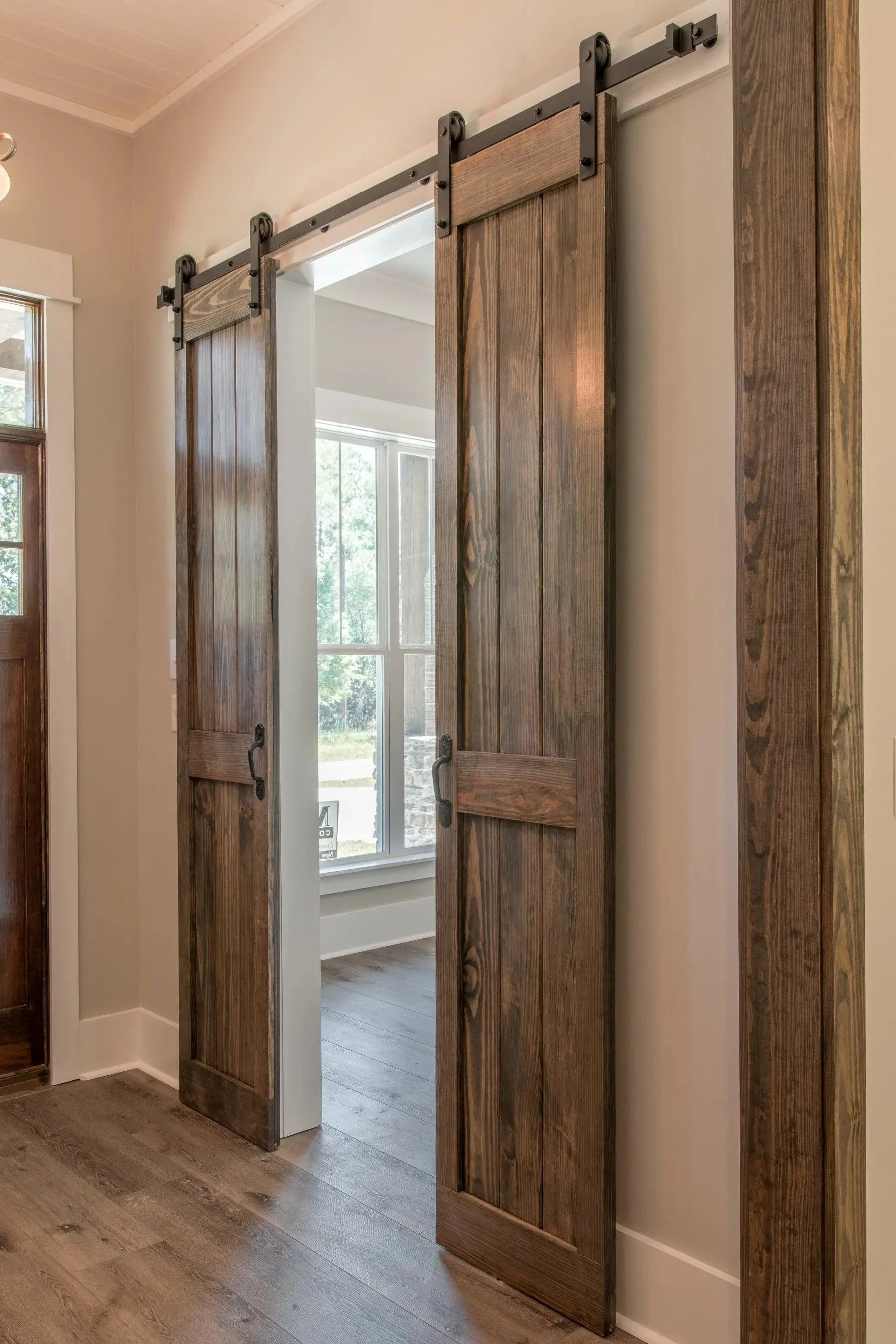 Elegant family home with spacious living, bonus room, and outdoor kitchen.