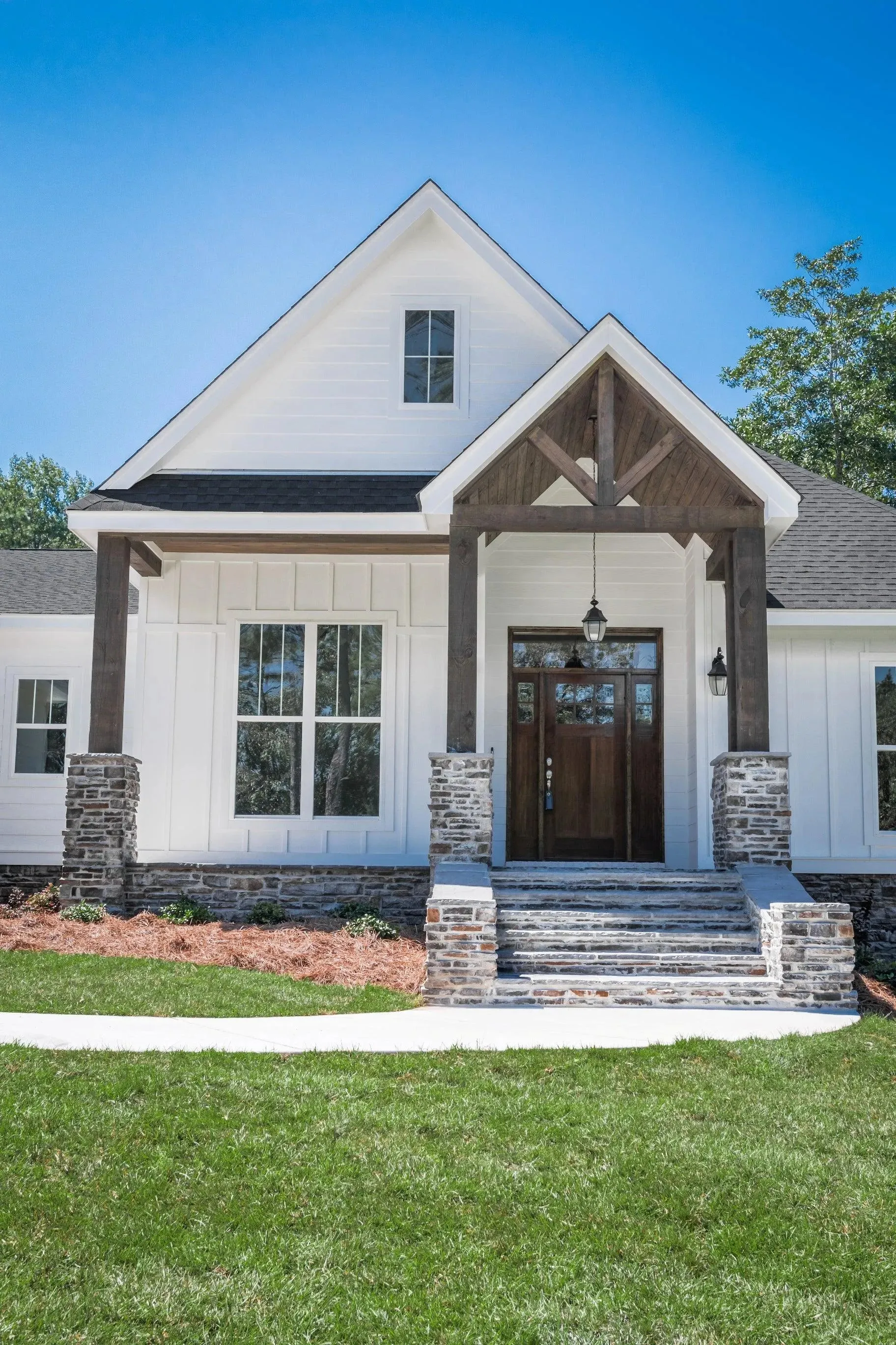 Elegant family home with spacious living, bonus room, and outdoor kitchen.