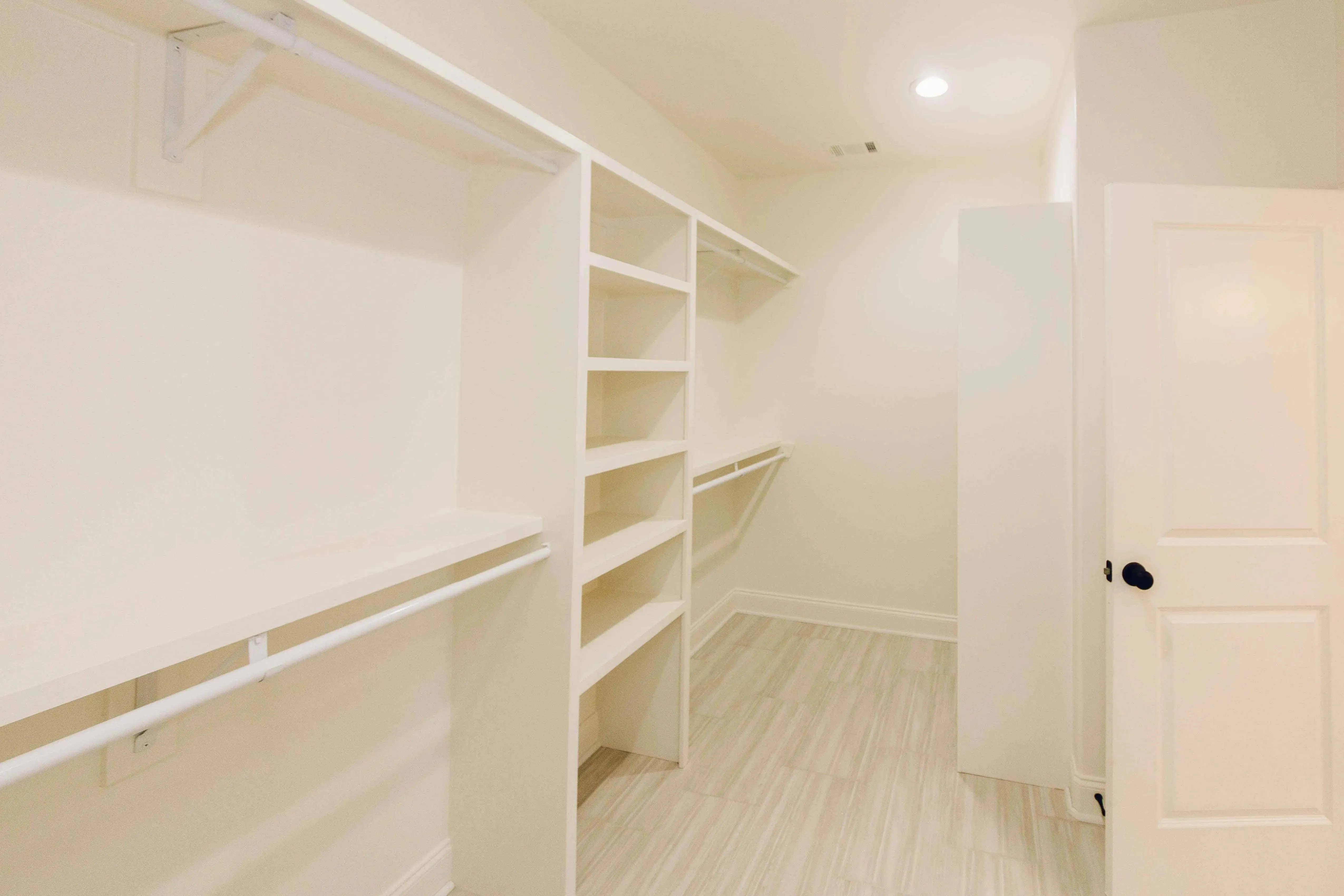 Elegant family home with spacious living, bonus room, and outdoor kitchen.