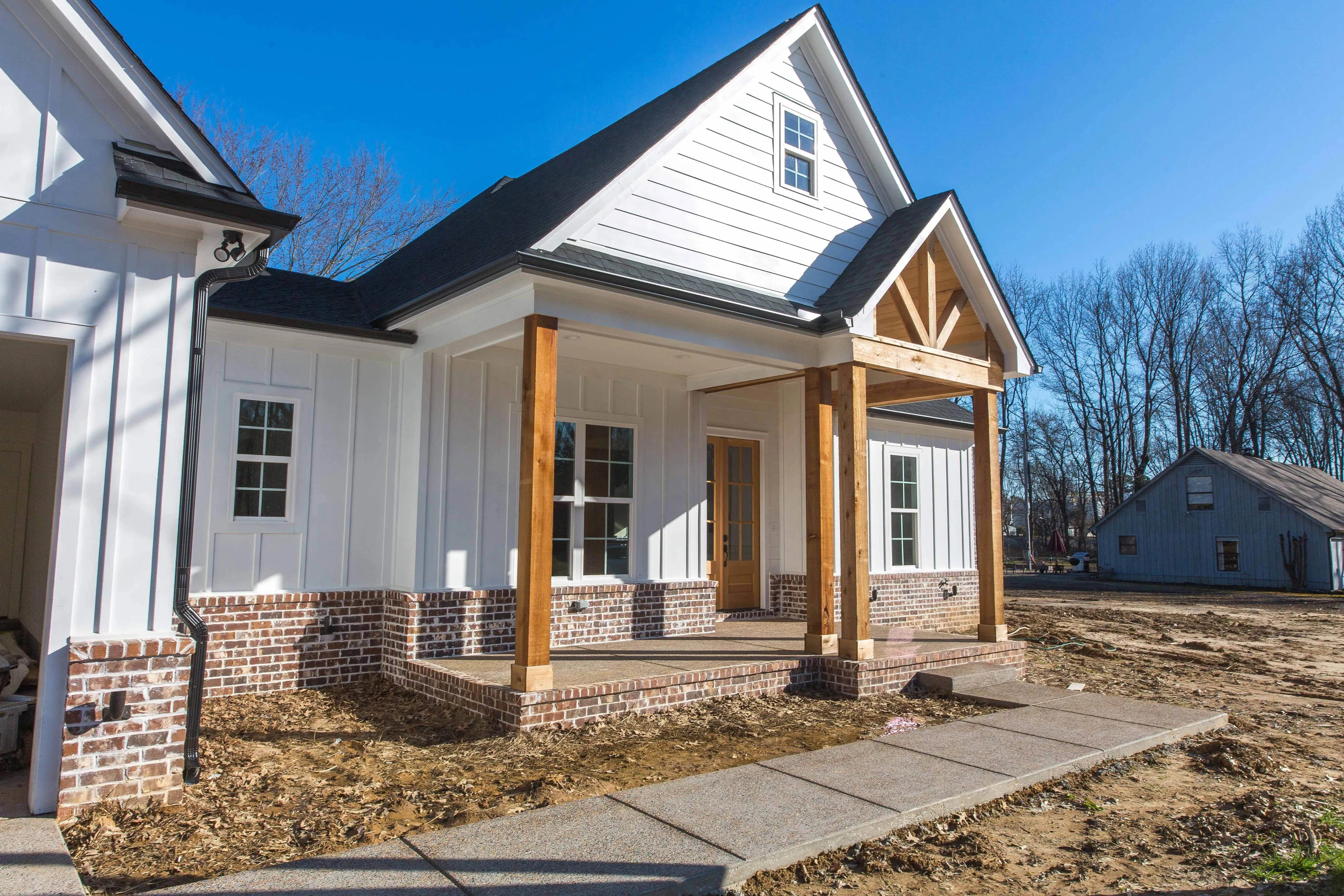 Elegant family home with spacious living, bonus room, and outdoor kitchen.
