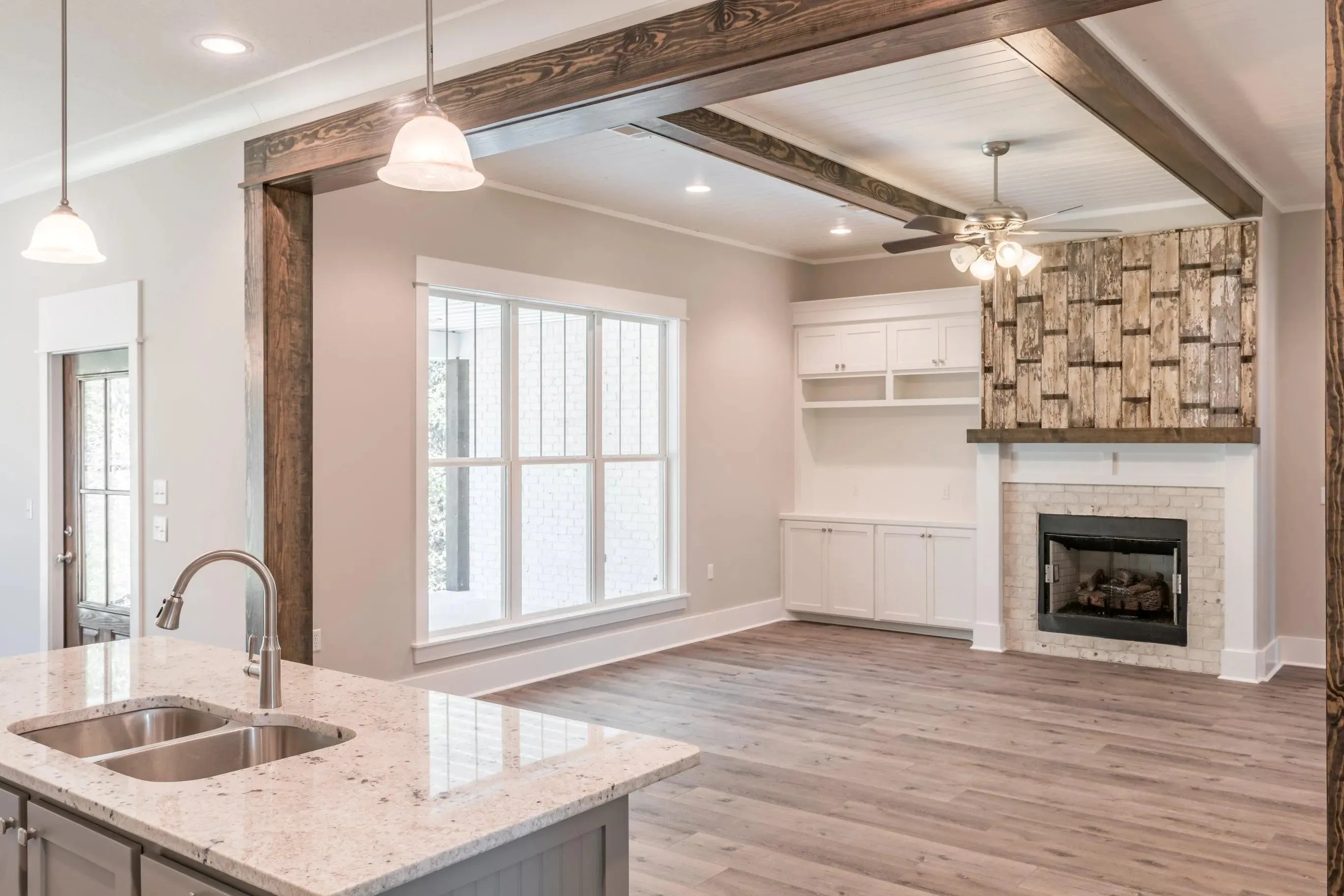 Elegant family home with spacious living, bonus room, and outdoor kitchen.