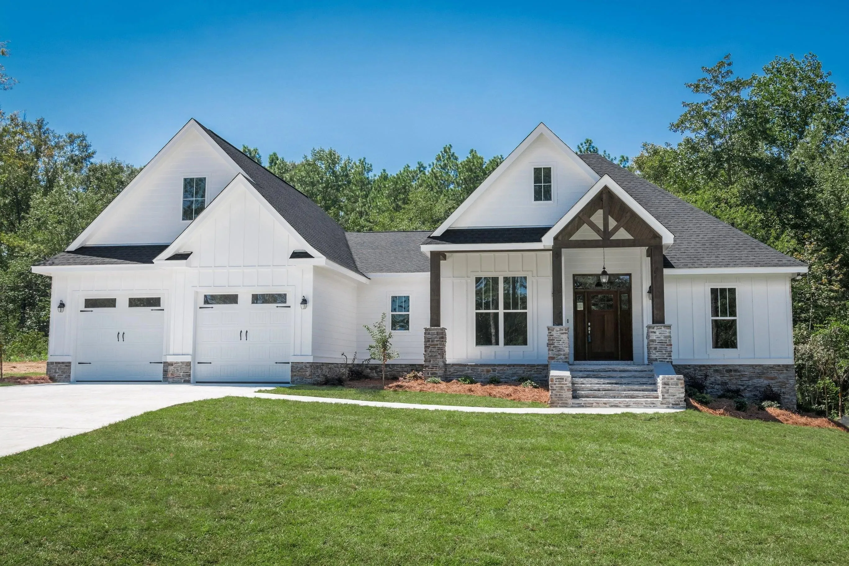 Elegant family home with spacious living, bonus room, and outdoor kitchen.