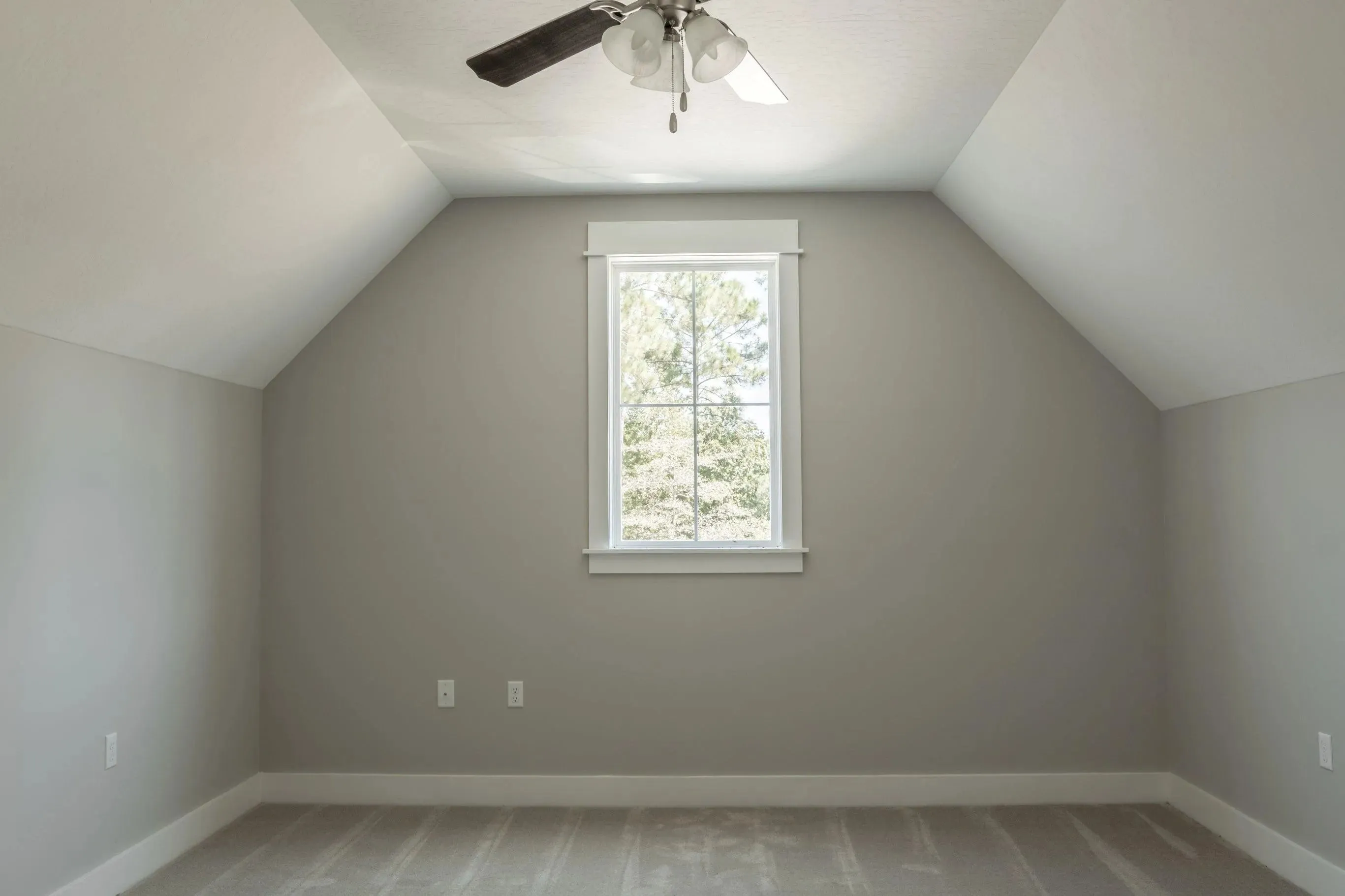 Elegant family home with spacious living, bonus room, and outdoor kitchen.
