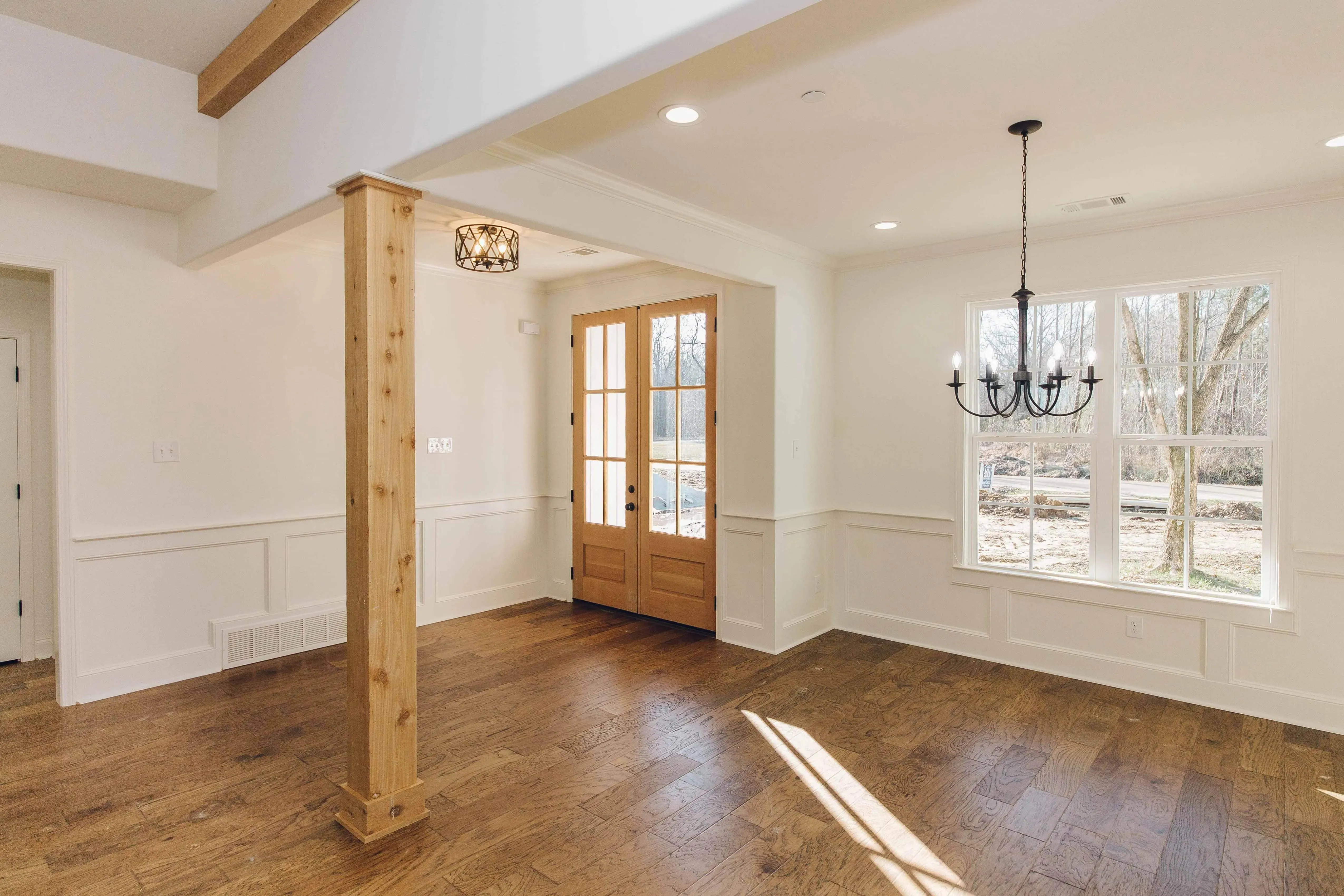 Elegant family home with spacious living, bonus room, and outdoor kitchen.