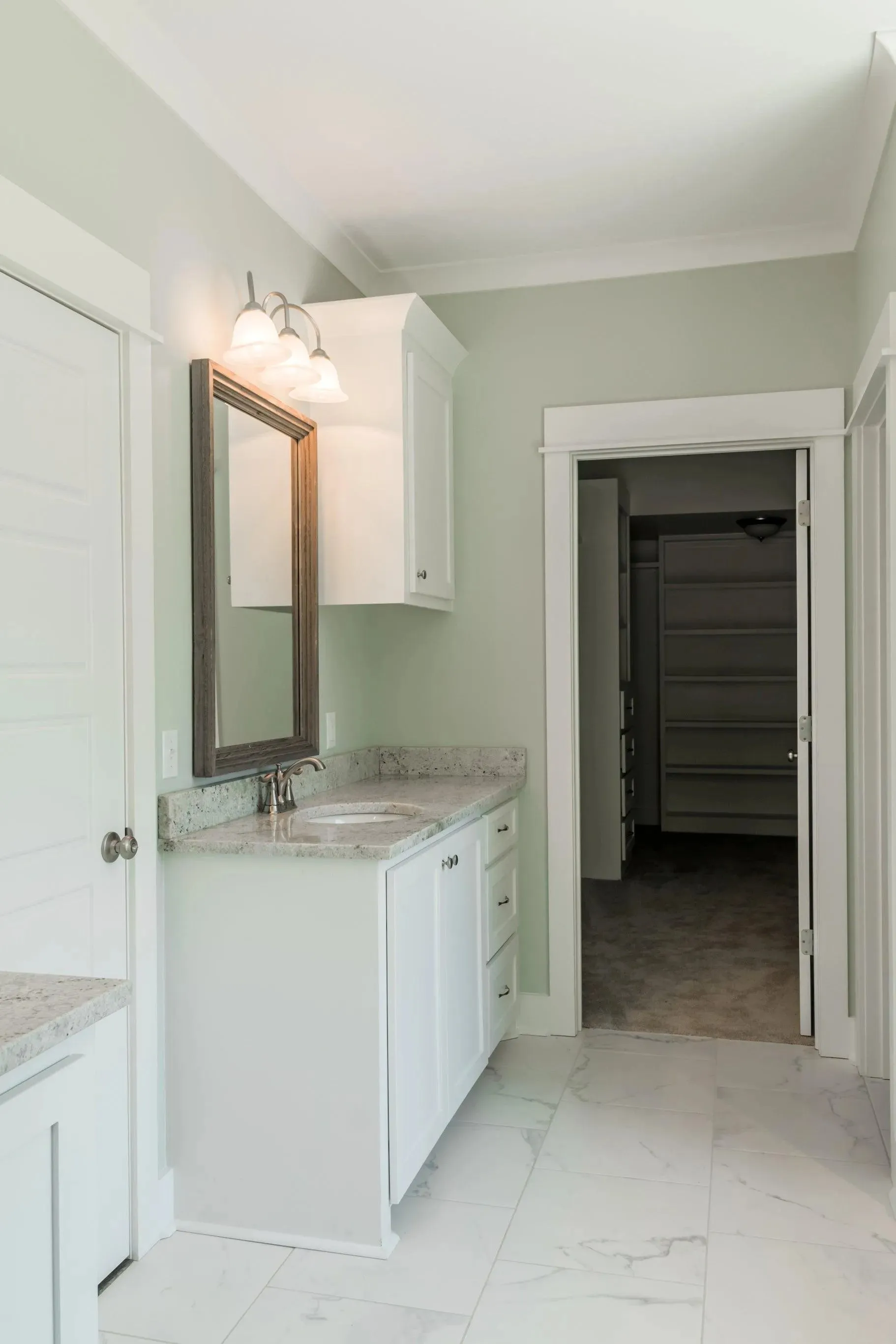 Elegant family home with spacious living, bonus room, and outdoor kitchen.
