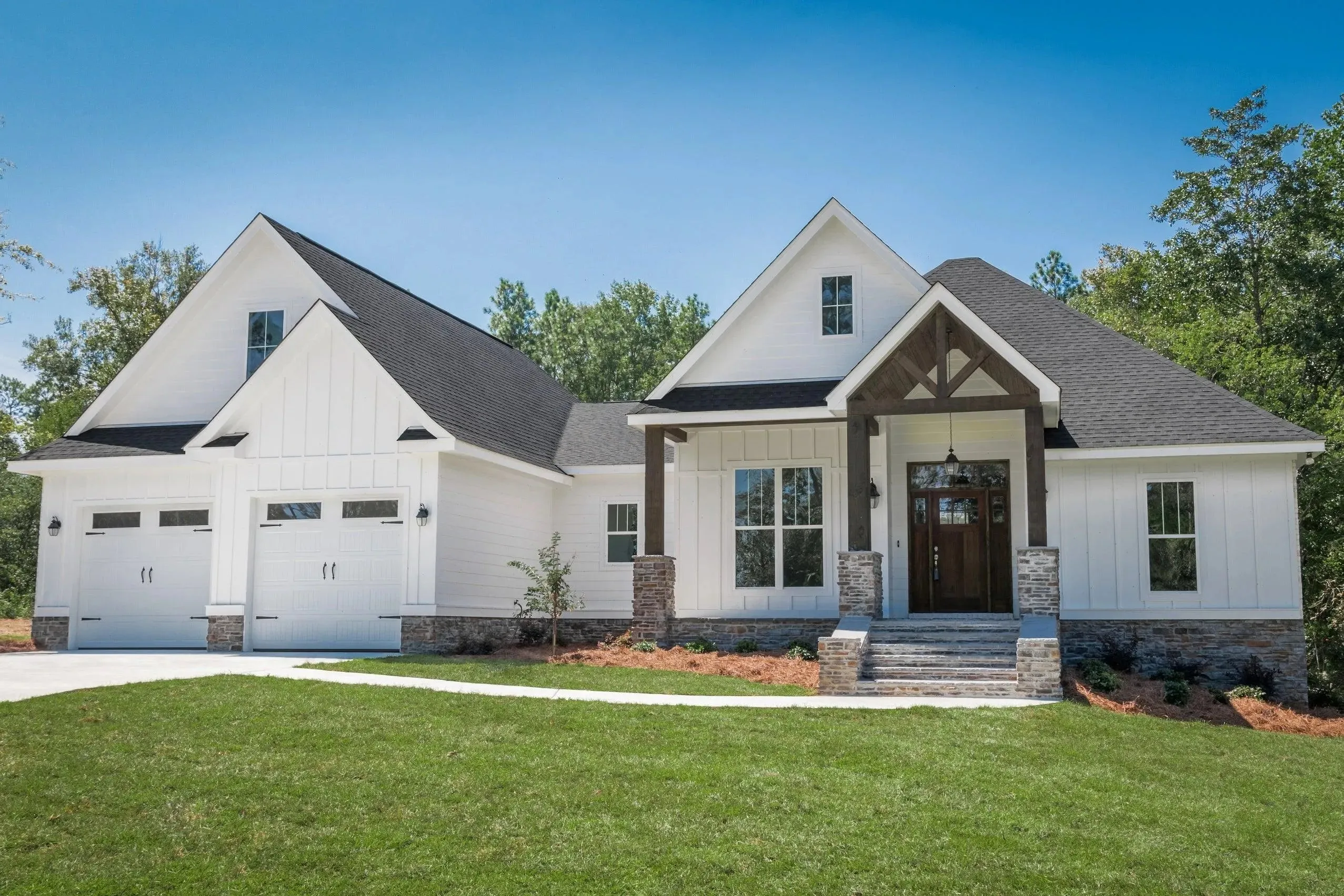 Elegant family home with spacious living, bonus room, and outdoor kitchen.