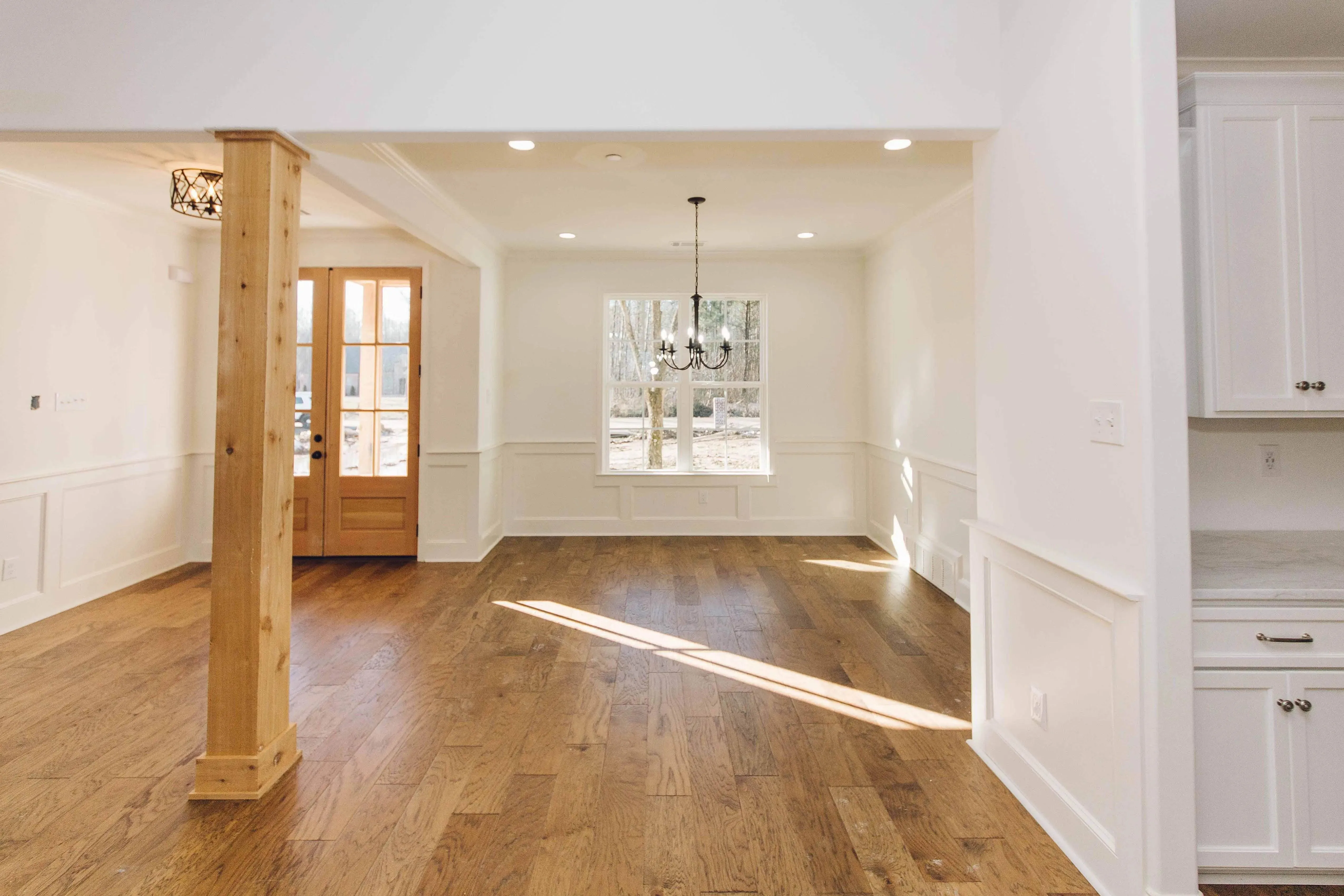 Elegant family home with spacious living, bonus room, and outdoor kitchen.