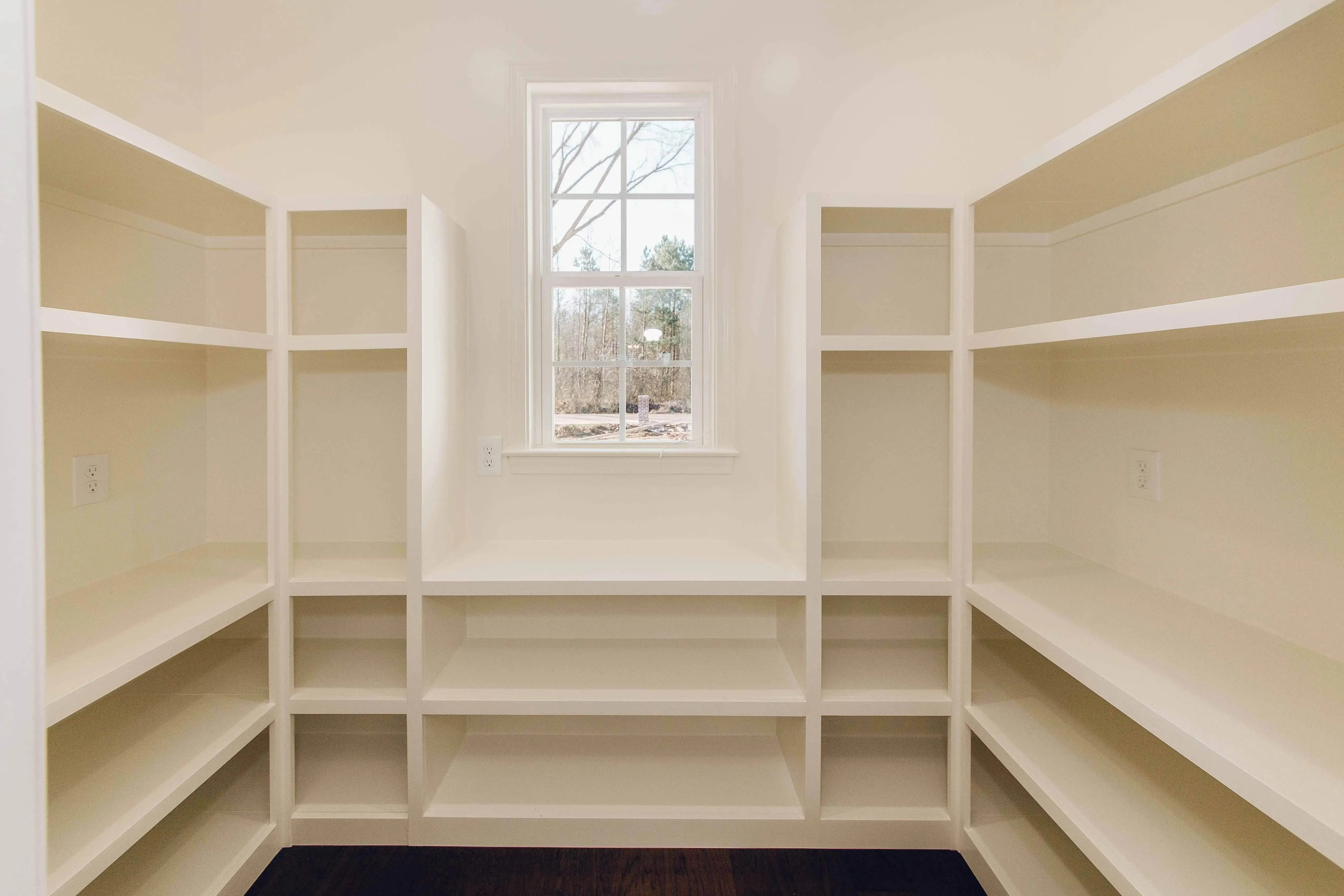 Elegant family home with spacious living, bonus room, and outdoor kitchen.