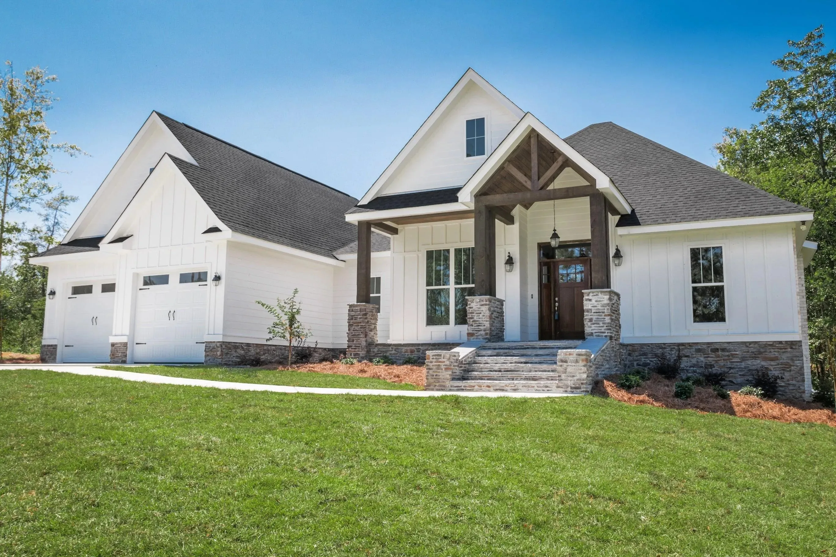 Elegant family home with spacious living, bonus room, and outdoor kitchen.