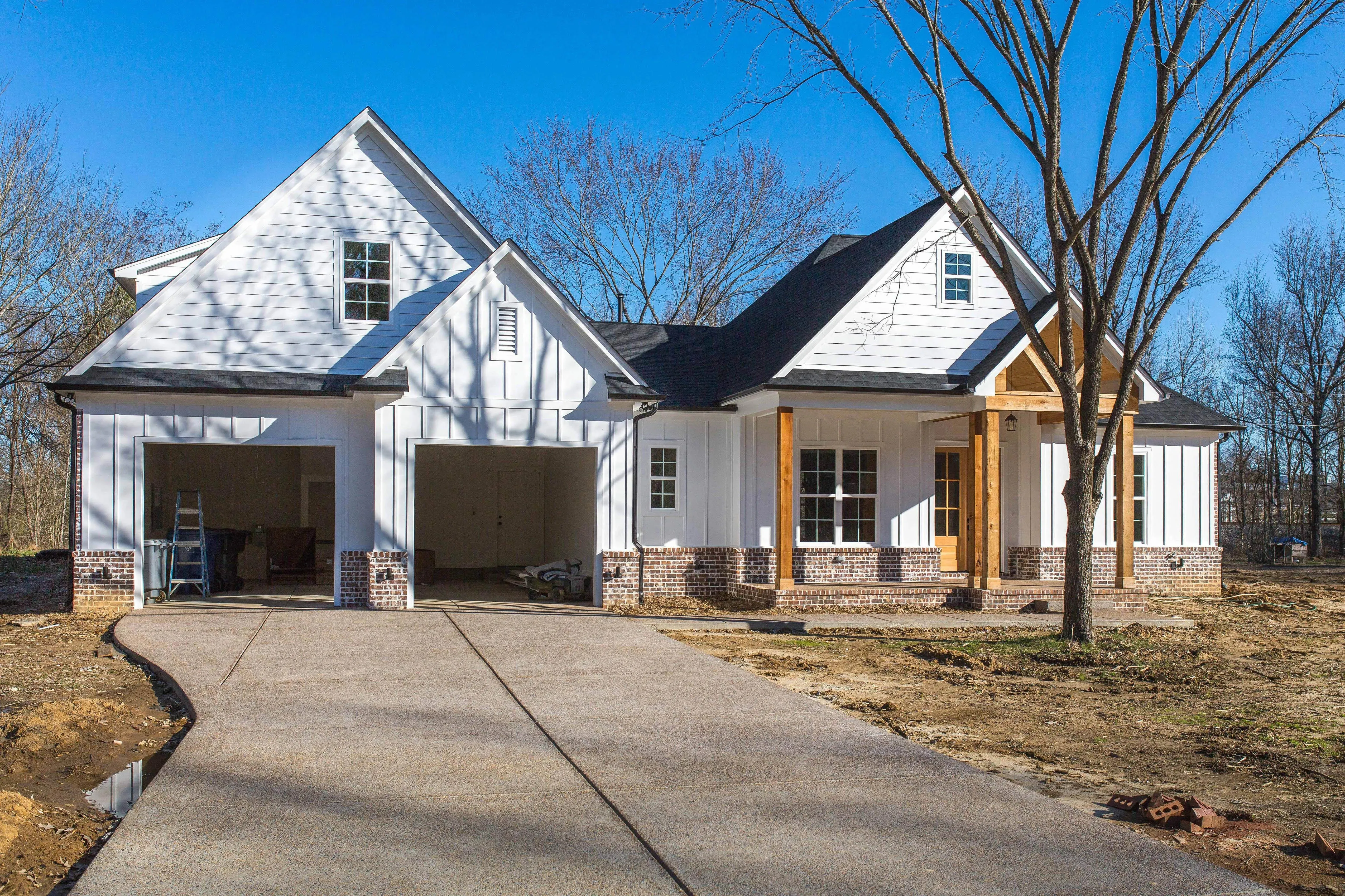 Elegant family home with spacious living, bonus room, and outdoor kitchen.