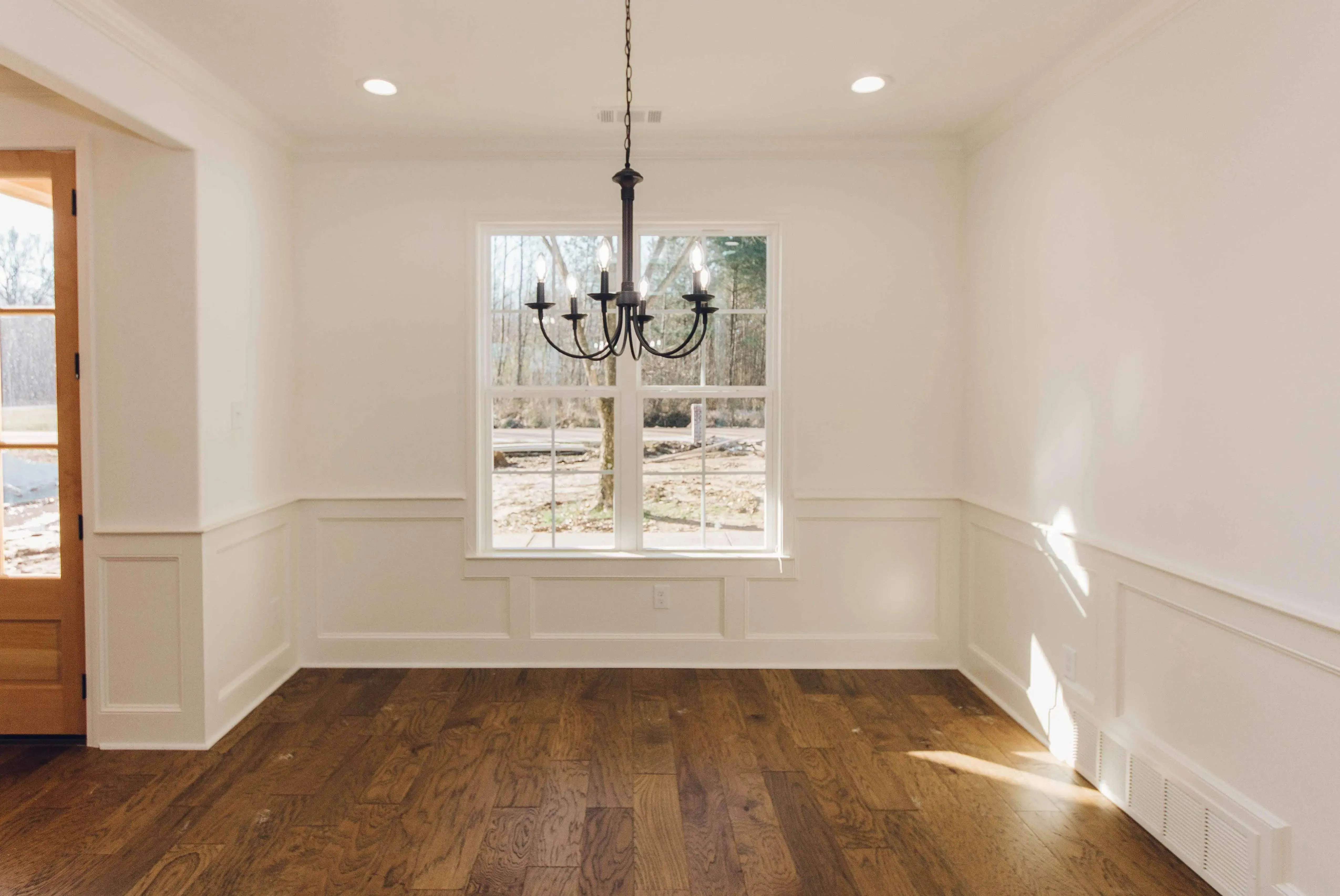 Elegant family home with spacious living, bonus room, and outdoor kitchen.