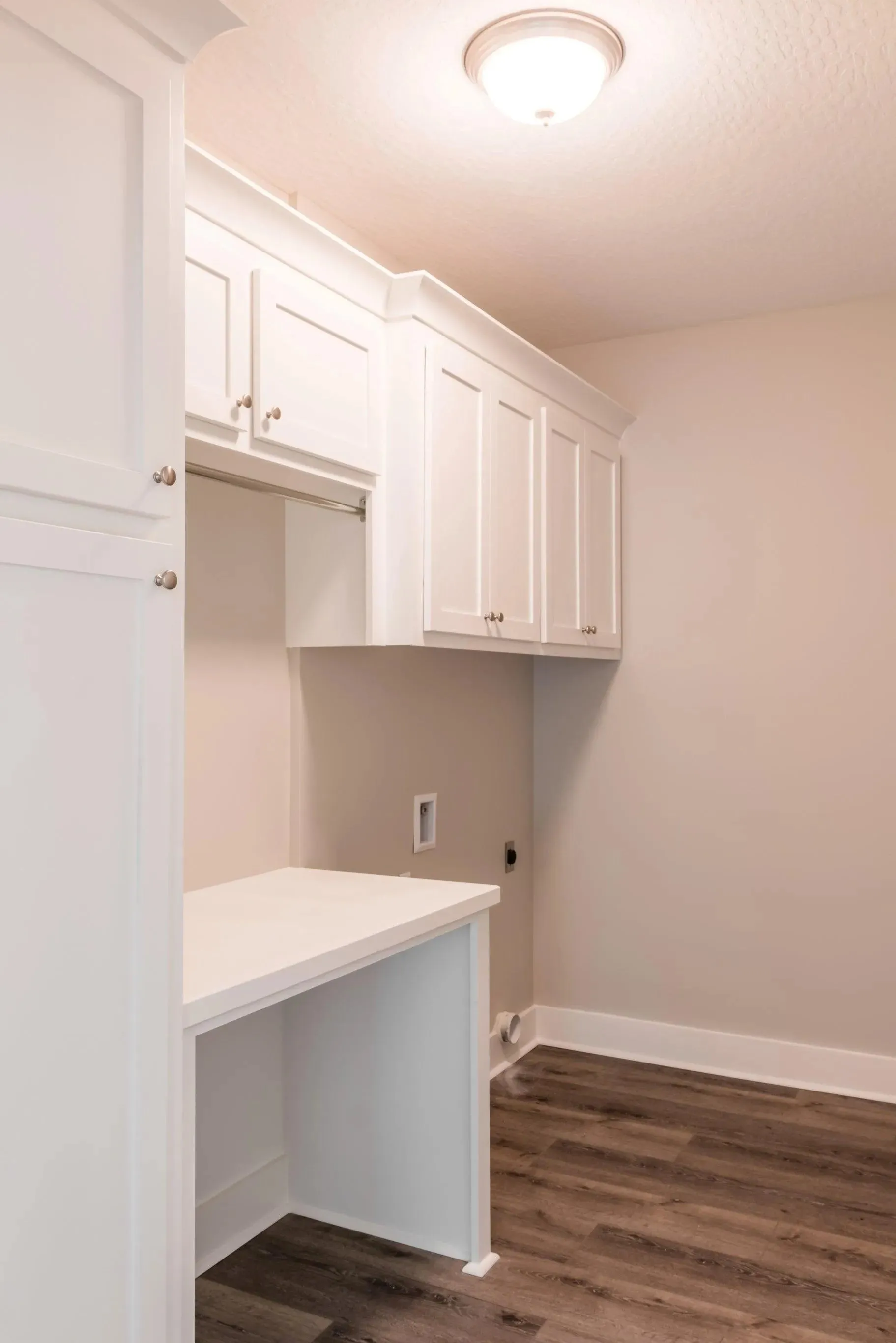 Elegant family home with spacious living, bonus room, and outdoor kitchen.