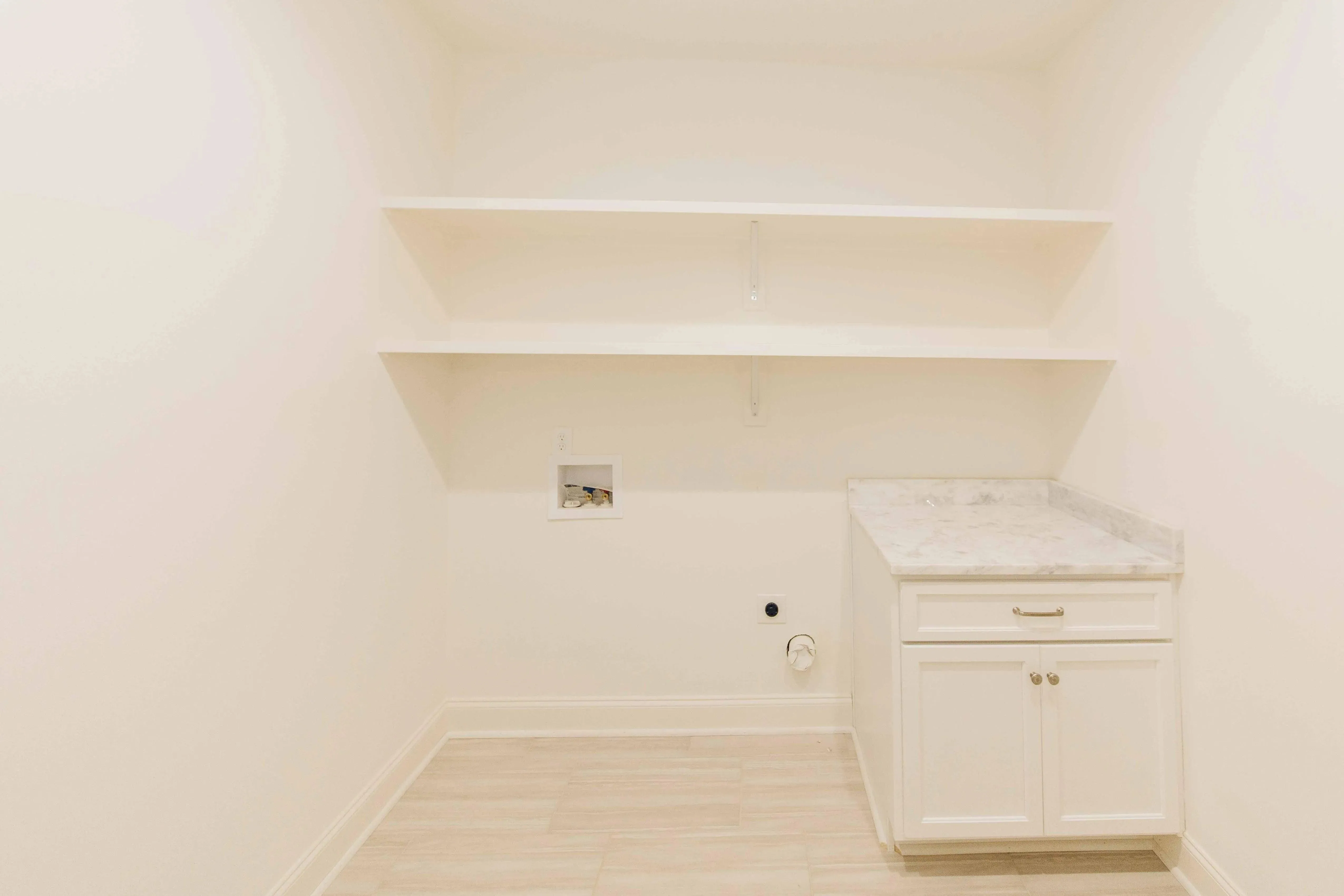 Elegant family home with spacious living, bonus room, and outdoor kitchen.