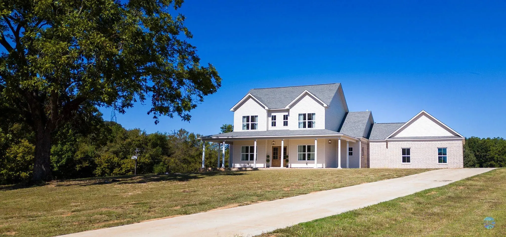Spacious 4-Bedroom, 3-Bathroom Home with Generous Porches and Modern Comforts